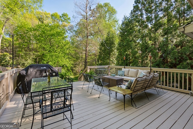 4584 E Conway Dr, Atlanta, GA 30327 - wooden deck featuring an outdoor hangout area, outdoor dining space, and a grill