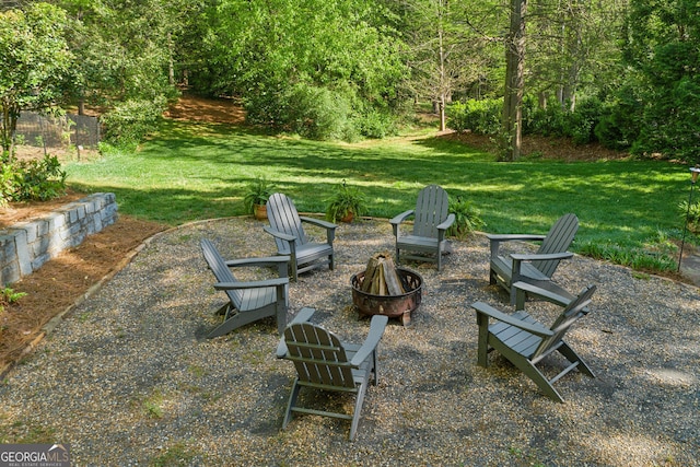 4584 E Conway Dr, Atlanta, GA 30327 - view of yard featuring an outdoor fire pit
