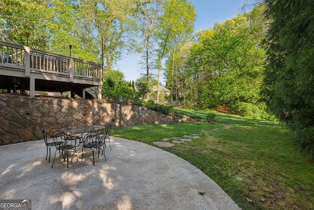 4584 E Conway Dr, Atlanta, GA 30327 - view of patio with a wooden deck and outdoor dining area