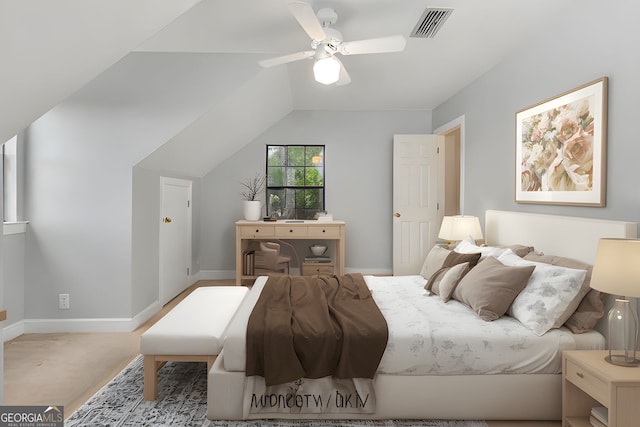 bedroom with a ceiling fan, baseboards, visible vents, and vaulted ceiling