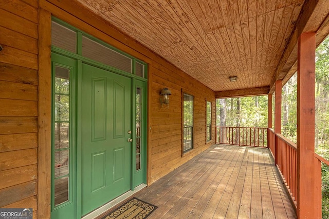 wooden terrace with covered porch
