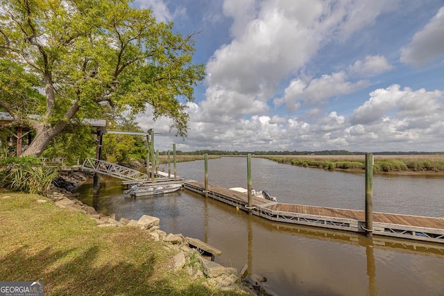 view of dock with a water view