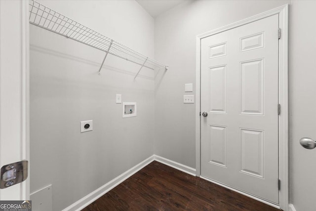 145 Redsage Rdg, Atlanta, GA 30349 - washroom featuring washer hookup, hookup for an electric dryer, dark wood-style flooring, and baseboards