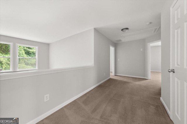 145 Redsage Rdg, Atlanta, GA 30349 - hall featuring attic access, carpet flooring, and baseboards