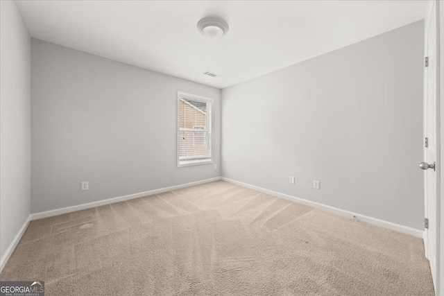 145 Redsage Rdg, Atlanta, GA 30349 - carpeted empty room featuring baseboards