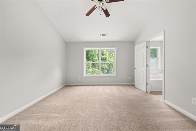 145 Redsage Rdg, Atlanta, GA 30349 - carpeted empty room featuring ceiling fan, vaulted ceiling, and baseboards