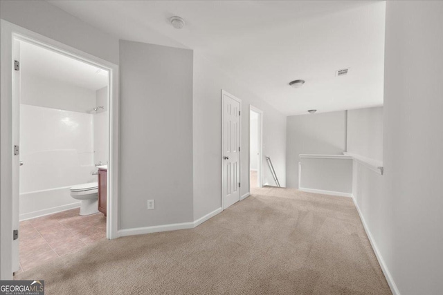 145 Redsage Rdg, Atlanta, GA 30349 - corridor featuring an upstairs landing, carpet, and baseboards