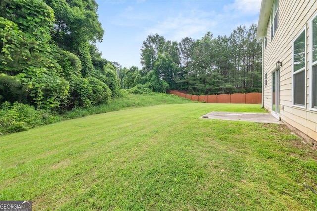 145 Redsage Rdg, Atlanta, GA 30349 - view of yard featuring a patio