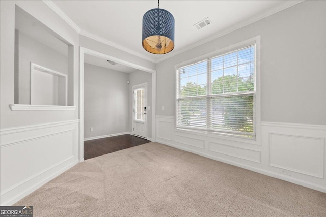 145 Redsage Rdg, Atlanta, GA 30349 - carpeted spare room featuring ornamental molding, wainscoting, and a decorative wall