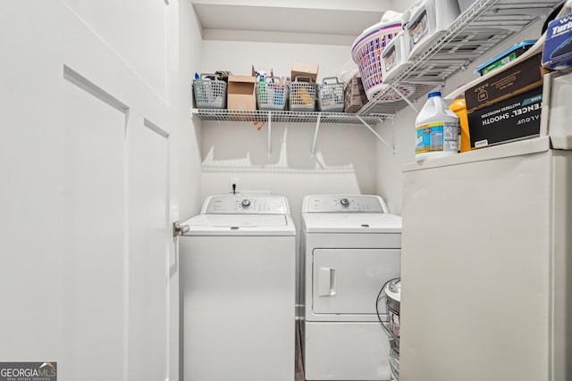 laundry area featuring washing machine and dryer