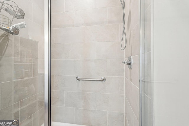 full bath featuring a stall shower