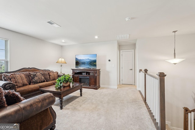 bedroom with light colored carpet