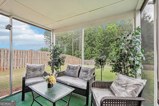 sunroom / solarium with an outdoor living space