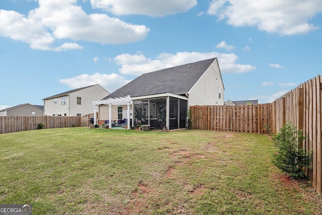 view of yard with a pergola and a sunroom