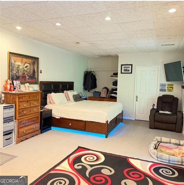 bedroom featuring recessed lighting and carpet floors