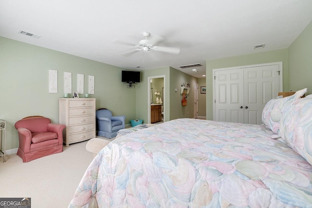 carpeted bedroom featuring baseboards, a ceiling fan, a closet, and visible vents