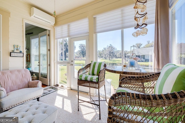 sunroom / solarium with a wall unit AC