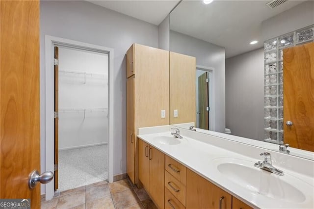 1294 Fernwood Cir NE, Brookhaven, GA 30319 - full bathroom with double vanity, toilet, visible vents, and a sink