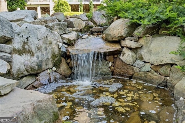 1294 Fernwood Cir NE, Brookhaven, GA 30319 - exterior details with a small pond