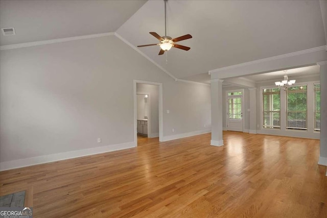 unfurnished living room featuring ornate columns, ornamental molding, ceiling fan with notable chandelier, and visible vents