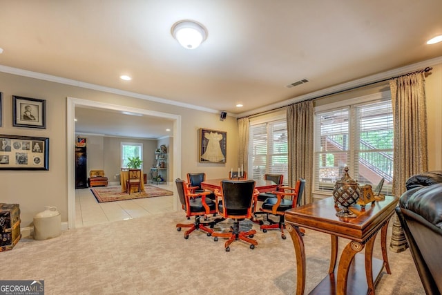 carpeted dining space with visible vents, ornamental molding, and recessed lighting
