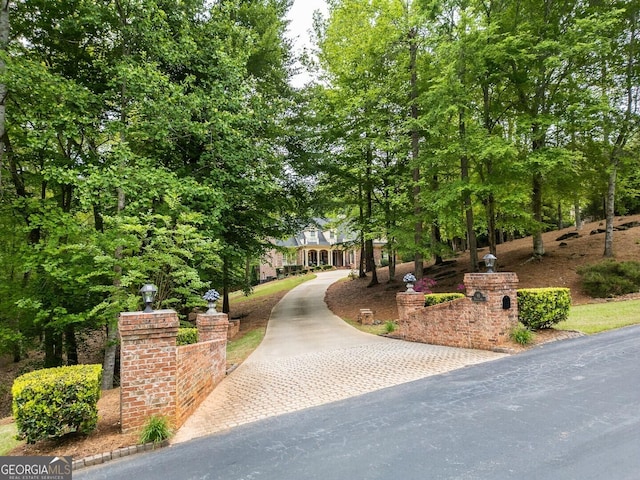 surrounding community featuring driveway