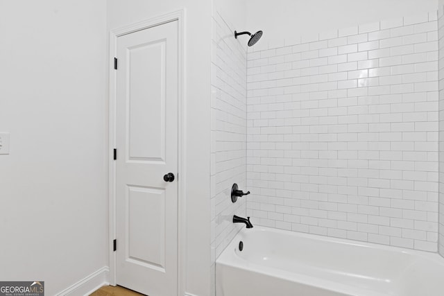 1488 Campbell Rd, Covington, GA 30014 - bathroom with baseboards and tub / shower combination