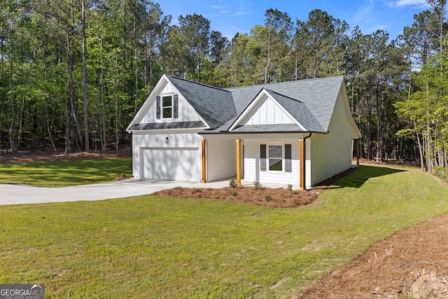1488 Campbell Rd, Covington, GA 30014 - modern inspired farmhouse featuring board and batten siding, driveway, a front yard, a garage, and a shingled roof