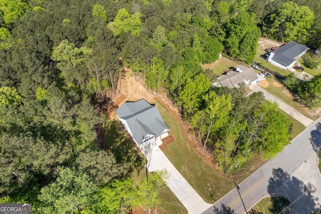 1488 Campbell Rd, Covington, GA 30014 - aerial view with a wooded view