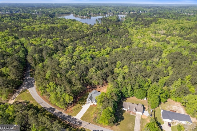1488 Campbell Rd, Covington, GA 30014 - drone / aerial view featuring a water view and a view of trees
