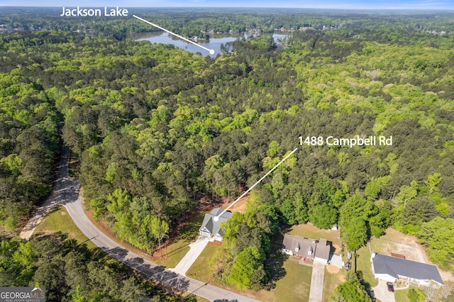 1488 Campbell Rd, Covington, GA 30014 - drone / aerial view with a water view and a wooded view