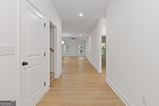 1488 Campbell Rd, Covington, GA 30014 - hall with baseboards, light wood finished floors, and lofted ceiling