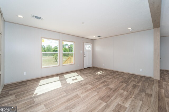 92 Wood Duck Ln, Folkston, GA 31537 - unfurnished living room featuring recessed lighting, visible vents, and light wood-style floors