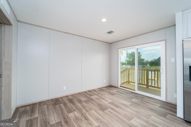 92 Wood Duck Ln, Folkston, GA 31537 - unfurnished room with visible vents, baseboards, ornamental molding, recessed lighting, and light wood-style flooring