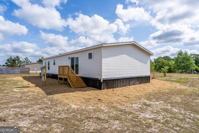 92 Wood Duck Ln, Folkston, GA 31537 - exterior space with fence and a deck