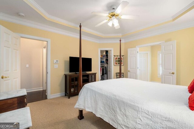 5 Renfroe Ct, Decatur, GA 30030 - carpeted bedroom featuring ornamental molding, a walk in closet, baseboards, a closet, and a ceiling fan