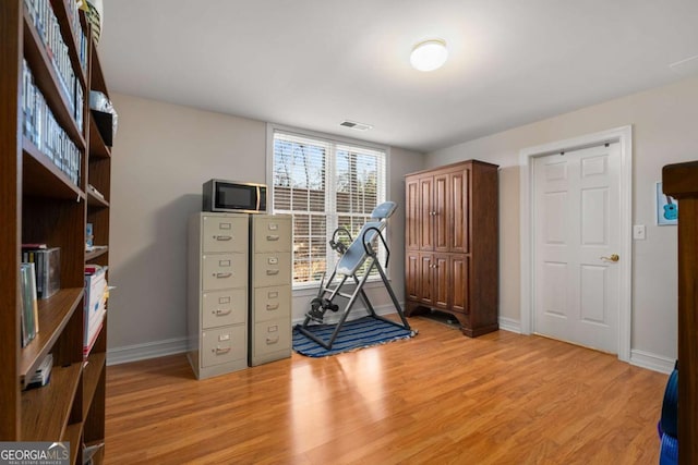 5 Renfroe Ct, Decatur, GA 30030 - exercise area with baseboards and light wood-style flooring
