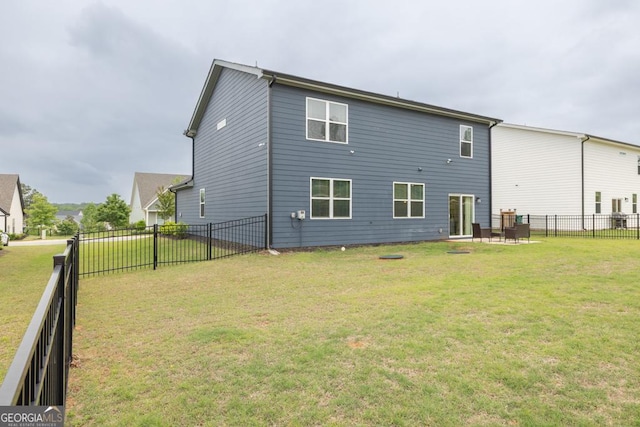 181 Sweet Briar Way, Homer, GA 30547 - rear view of house with a fenced backyard and a patio