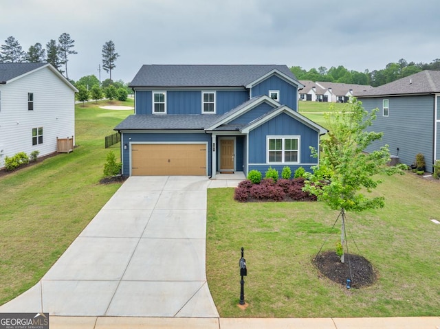 181 Sweet Briar Way, Homer, GA 30547 - traditional-style house with concrete driveway, board and batten siding, a garage, a front yard, and a shingled roof