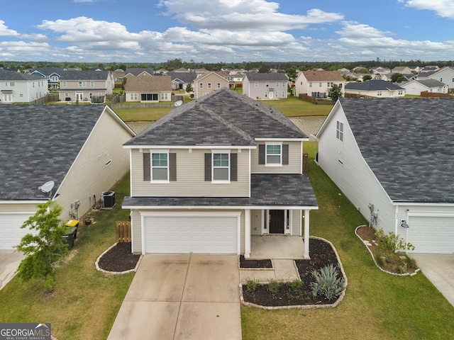234 Lakepointe Dr, Savannah, GA 31407 - traditional-style house with a residential view, a shingled roof, a front lawn, a garage, and concrete driveway