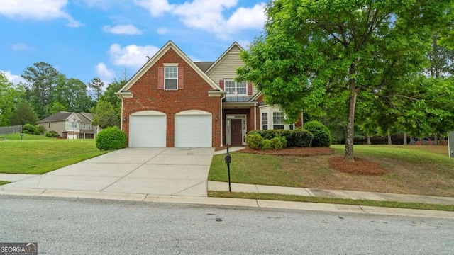 traditional-style home with brick siding, driveway, a front yard, and a garage