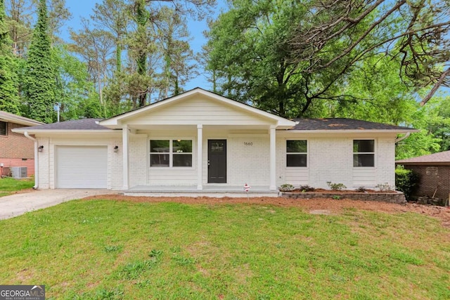 single story home with an attached garage, a front lawn, brick siding, a porch, and concrete driveway
