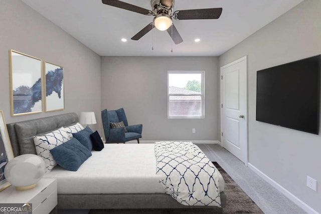 bedroom with baseboards, recessed lighting, carpet floors, and a ceiling fan