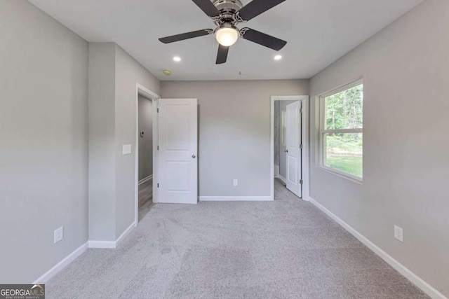 unfurnished bedroom with baseboards, carpet, and recessed lighting