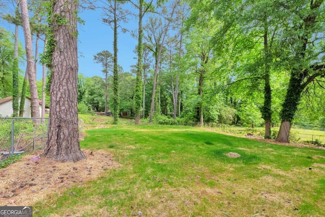 view of yard featuring fence