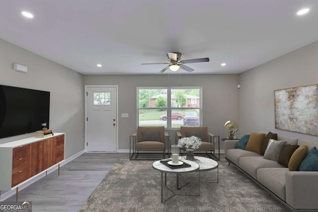 living area with light wood-style floors, baseboards, a ceiling fan, and recessed lighting