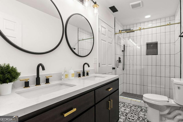 full bathroom featuring visible vents, a sink, tile patterned floors, and toilet