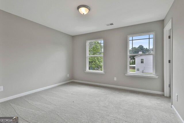 51 Camden Cir, Newnan, GA 30265 - carpeted empty room featuring baseboards and visible vents