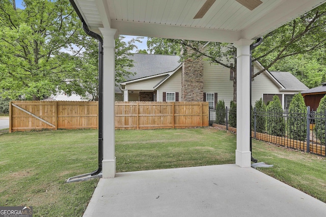 51 Camden Cir, Newnan, GA 30265 - view of yard with a ceiling fan, a patio area, and fence
