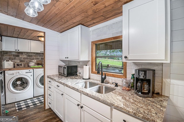 370 David Williams, Sparta, GA 31087 - laundry room featuring a sink, wood ceiling, washing machine and dryer, and dark wood-style floors